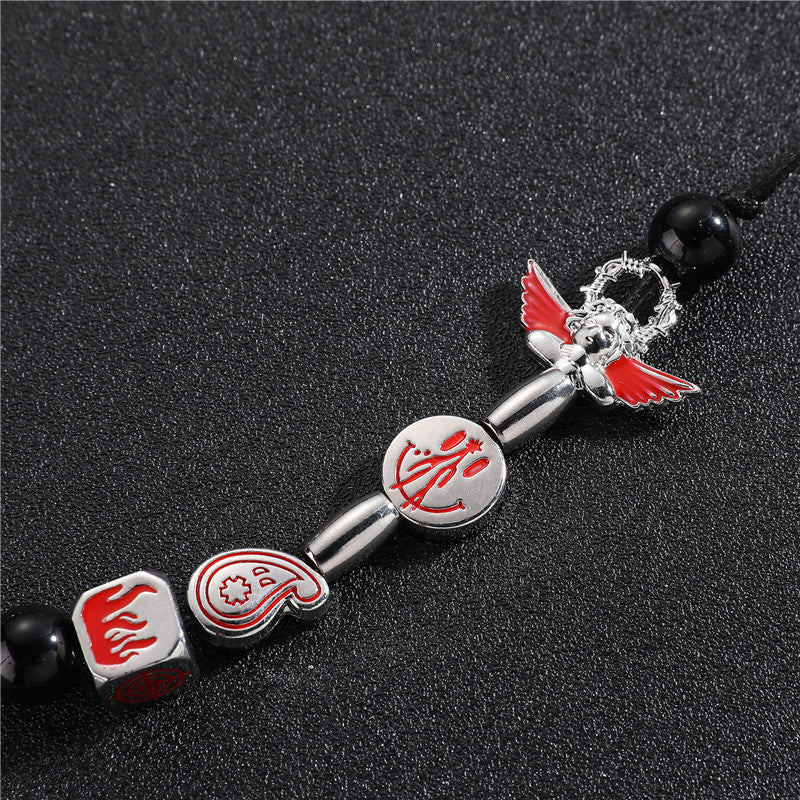 Venta al por mayor aleación Smiley Skull Angel collar de perlas negras